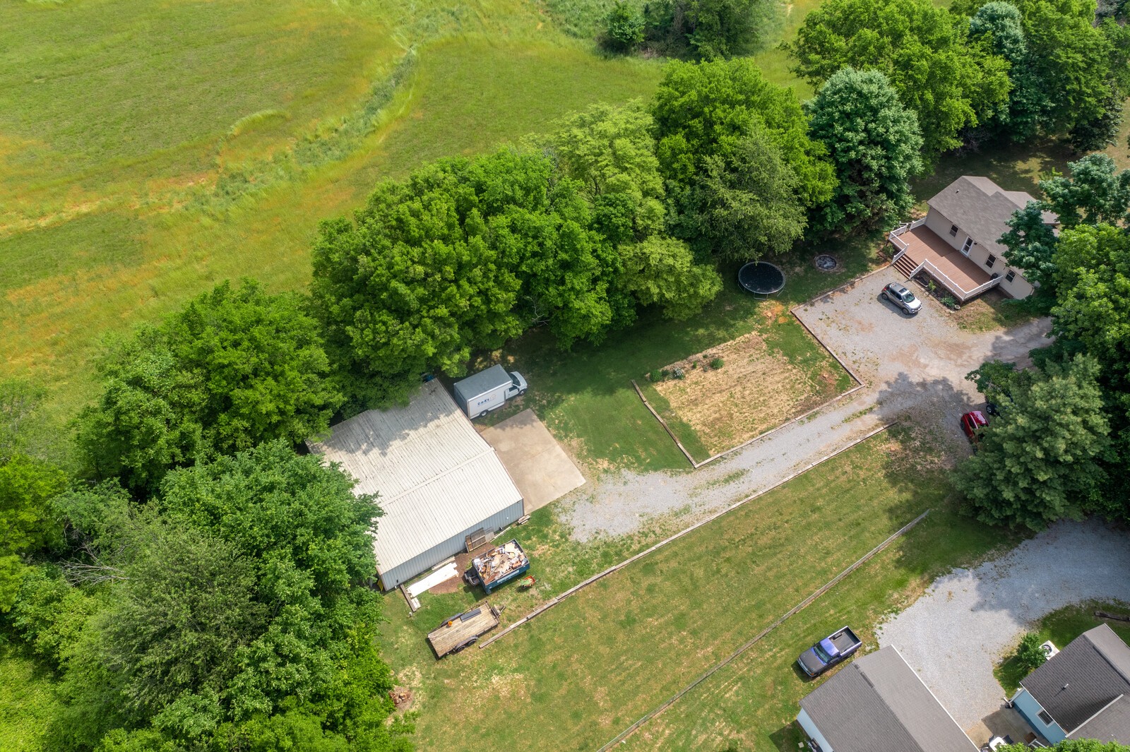 6658 Highway 49 Springfield, TN 37172 - Photo 41 of 44 an aerial view of a house with a yard and lake view