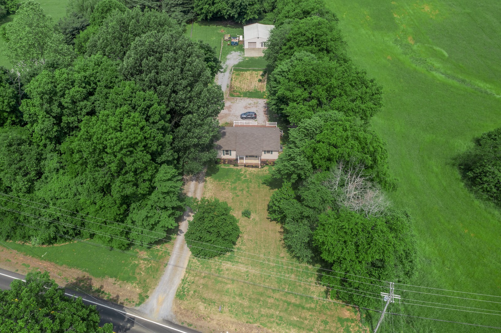 6658 Highway 49 Springfield, TN 37172 - Photo 44 of 44 an aerial view of a house with a yard