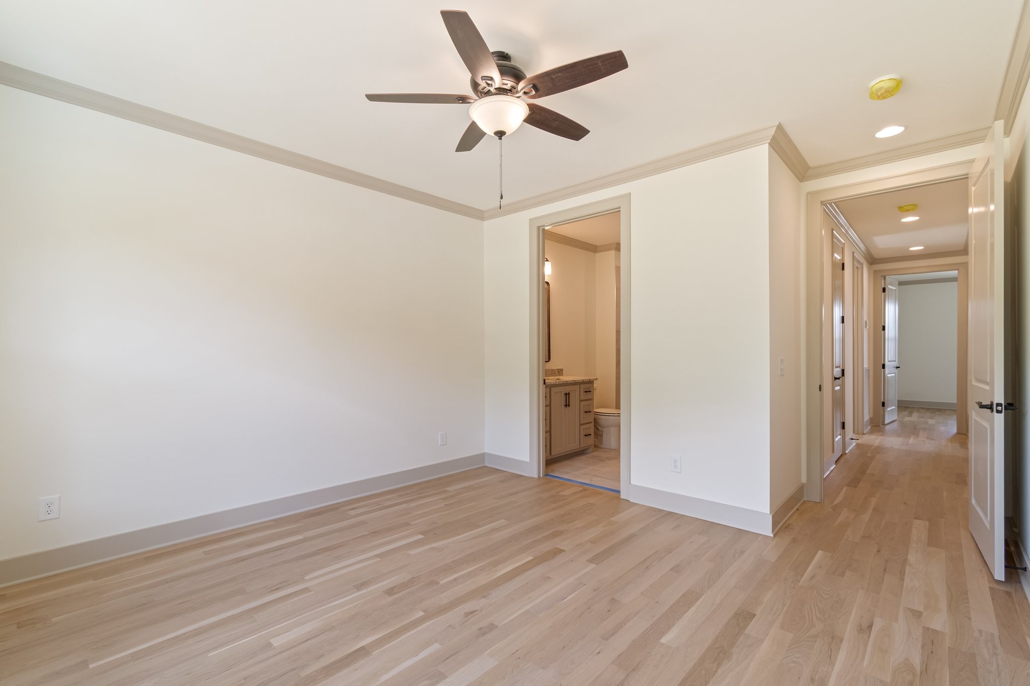 4100 Affiant Way Culleoka, TN 38451 - Photo 20 of 27 a view of a livingroom with wooden floor and a ceiling fan