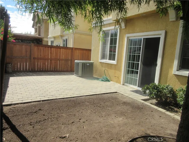 a view of a backyard of a house