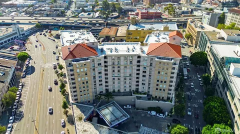 an aerial view of houses with yard