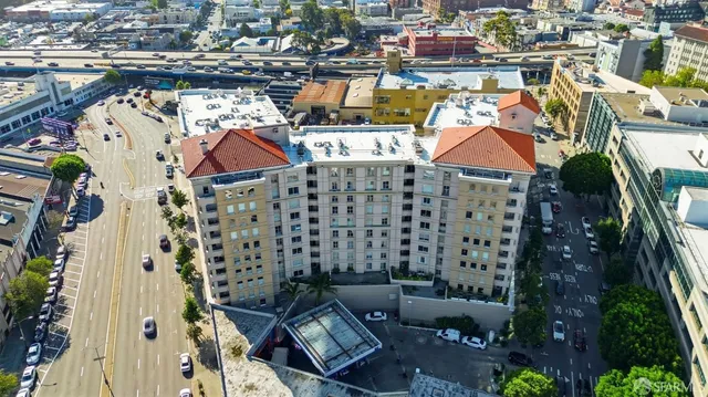 an aerial view of houses with yard