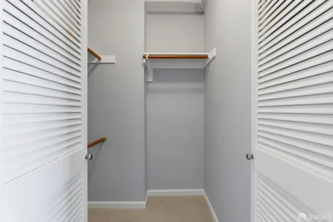 a bathroom with a shower and a toilet