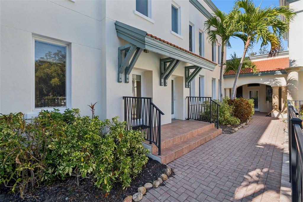 1685 Laurel Street, Unit 3 Sarasota, FL 34236 - Photo 2 of 54 a front view of a house with garden