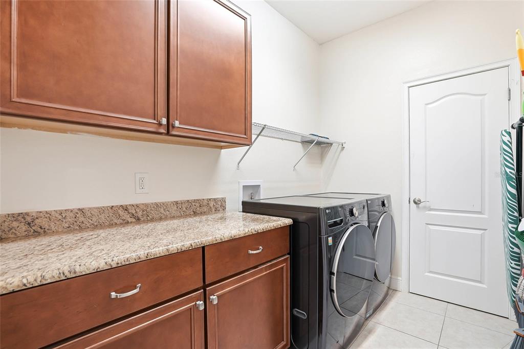 2906 West Douglas Street Tampa, FL 33607 - Photo 15 of 36 a utility room with washer and dryer