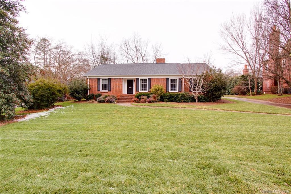 1400 Ferncliff Road Charlotte, NC 28211 - Photo 1 of 21 a front view of house with yard and trees around