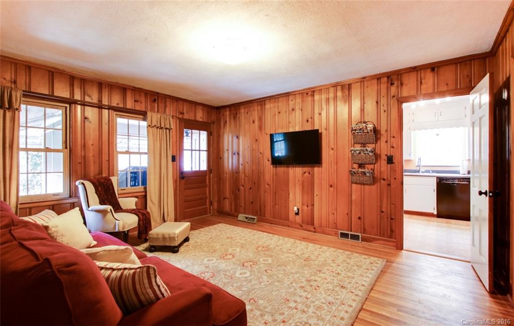 1400 Ferncliff Road Charlotte, NC 28211 - Photo 12 of 21 a bedroom with a bed and wooden floor