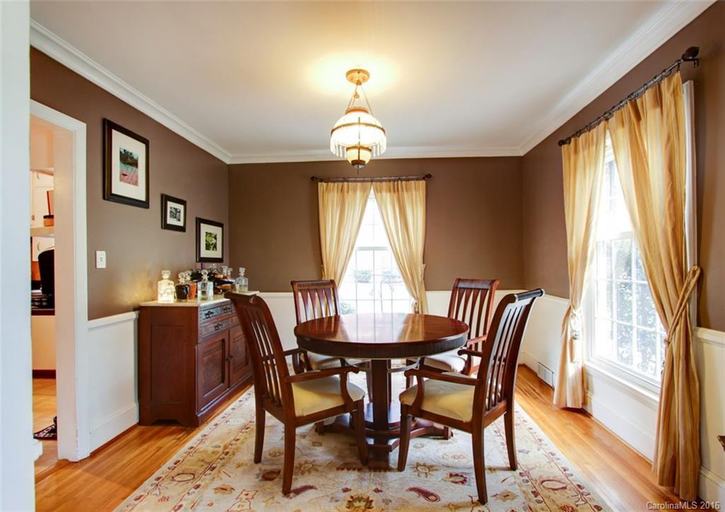 1400 Ferncliff Road Charlotte, NC 28211 - Photo 5 of 21 a view of a dining room with furniture window and wooden floor