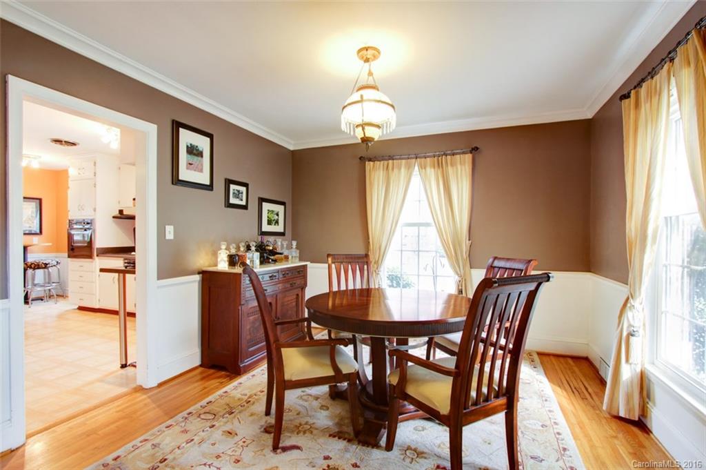 1400 Ferncliff Road Charlotte, NC 28211 - Photo 6 of 21 a view of a dining room with furniture and a chandelier