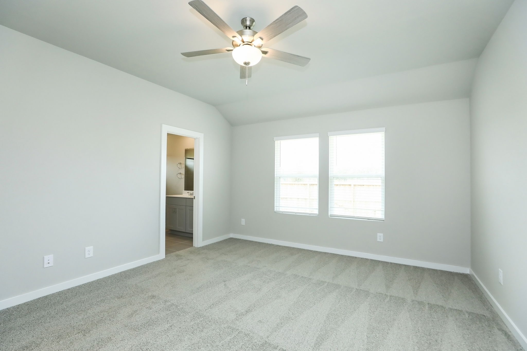 14110 Greystone Ter Street Magnolia, TX 77354 - Photo 8 of 34 The Generous Primary Suite Is The Perfect Escape After A Long Day.