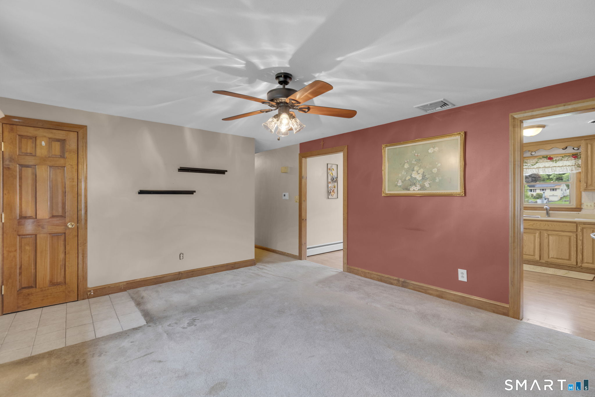 102 Wayne Lane Meriden, CT 06450 - Photo 5 of 36 an empty room with windows and fan