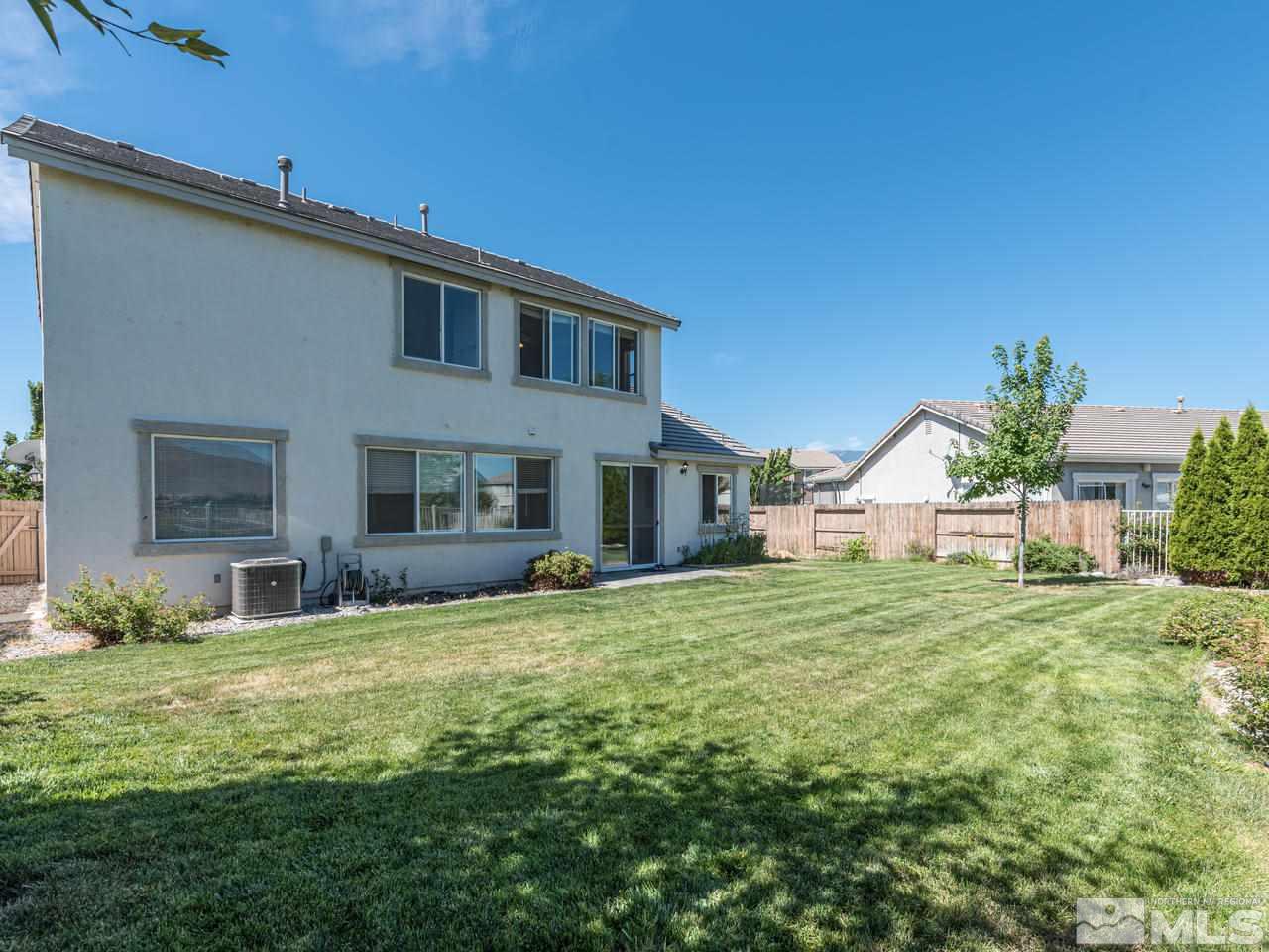 2525 Baton Drive Reno, NV 89521 - Photo 4 of 23 a house view with a sitting space and garden