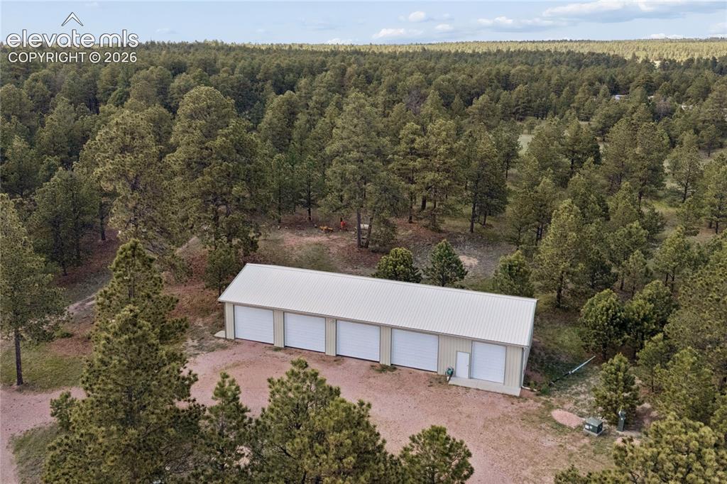 10840 Vollmer Road Colorado Springs, CO 80908 - Photo 5 of 49 an aerial view of a house