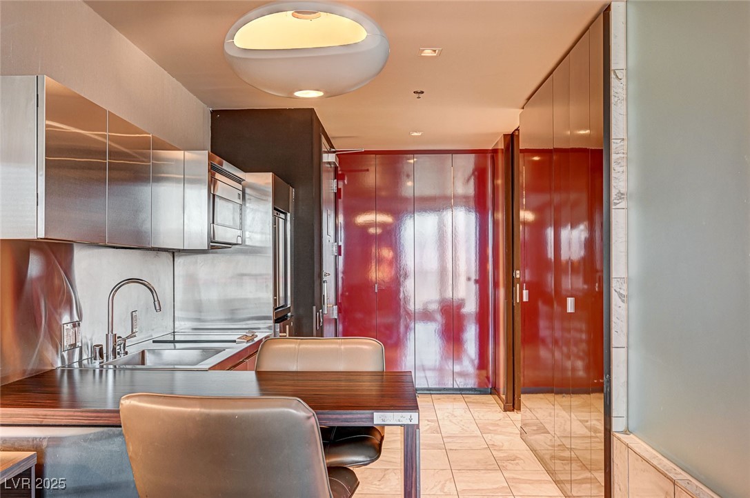 4381 West Flamingo Road, Unit 53307 Las Vegas, NV 89103 - Photo 11 of 45 Kitchen featuring modern cabinets