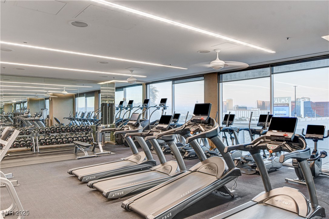 4381 West Flamingo Road, Unit 53307 Las Vegas, NV 89103 - Photo 30 of 45 Gym featuring expansive windows