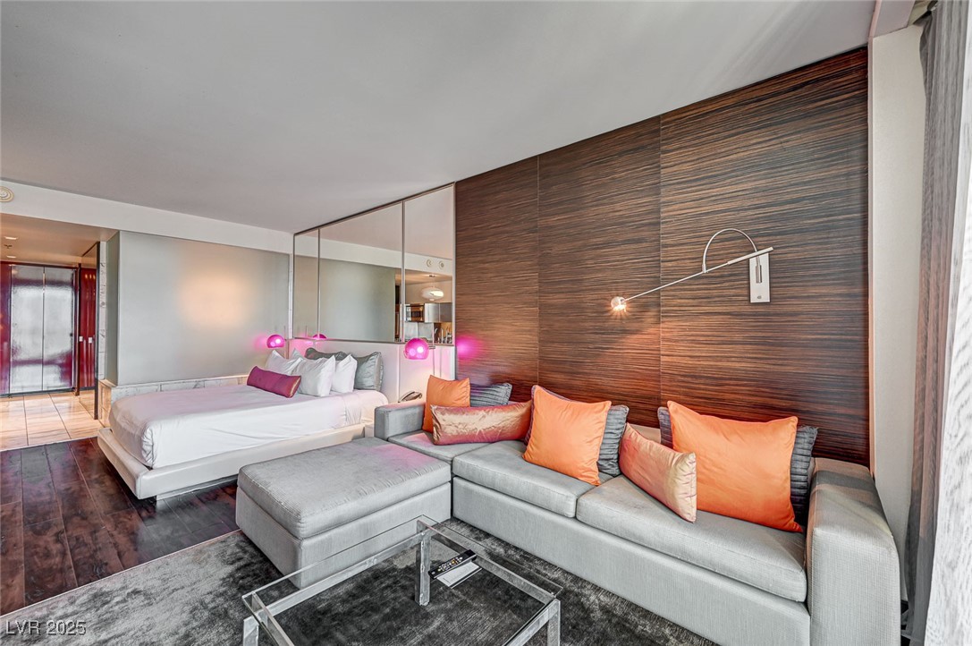 4381 West Flamingo Road, Unit 53307 Las Vegas, NV 89103 - Photo 7 of 45 Bedroom with wood finished floors