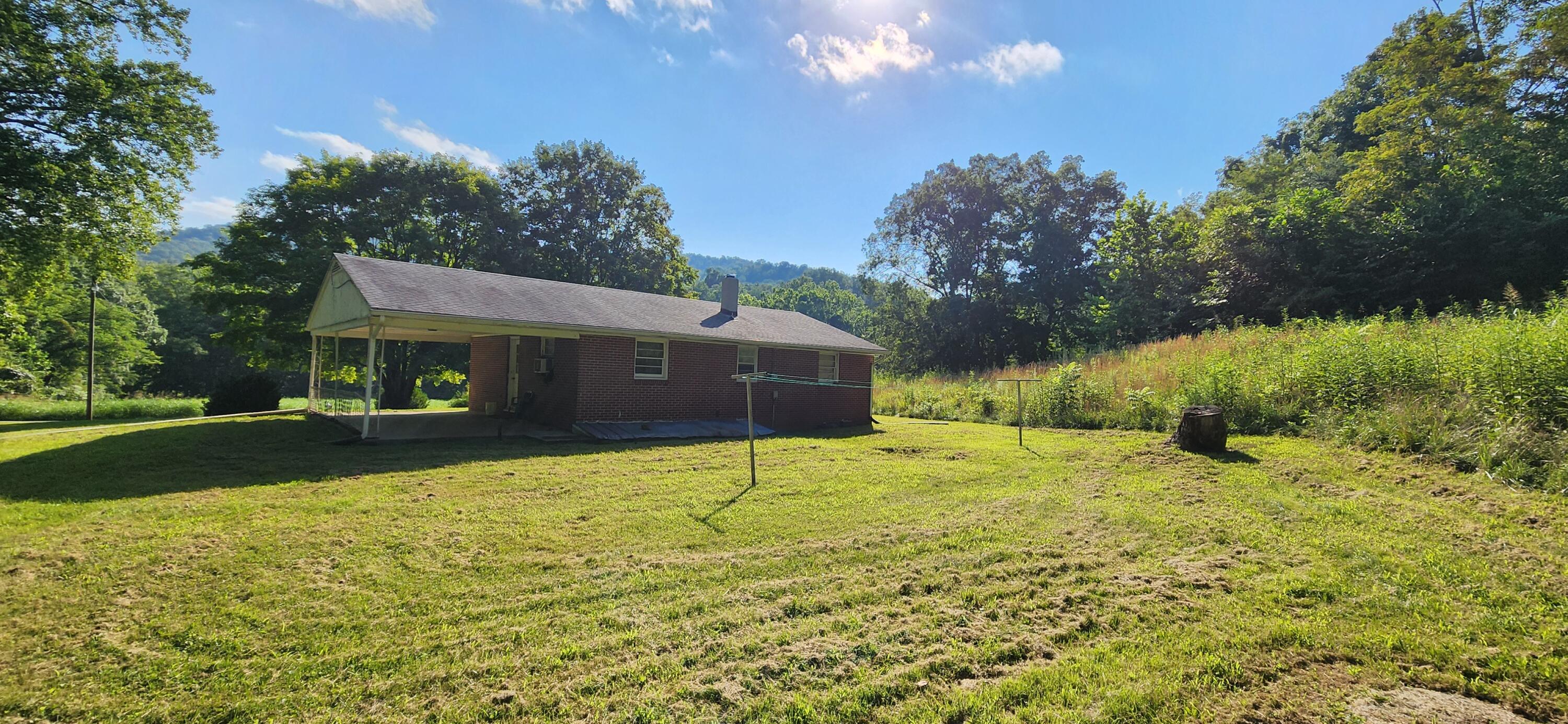 1762 Runnett Bag Road Ferrum, VA 24088 - Photo 13 of 14 a house view with a outdoor space