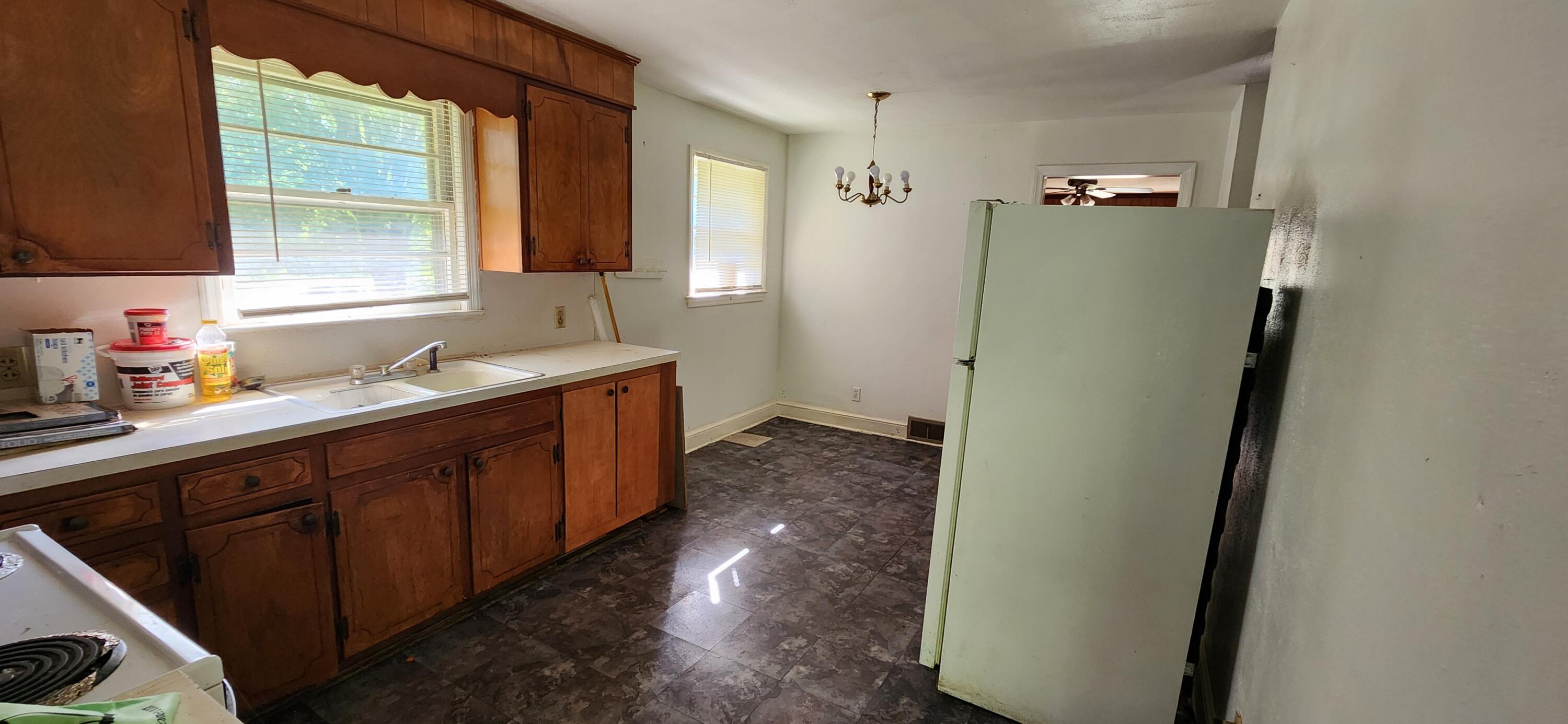 1762 Runnett Bag Road Ferrum, VA 24088 - Photo 4 of 14 a bathroom with a sink a mirror and a shower