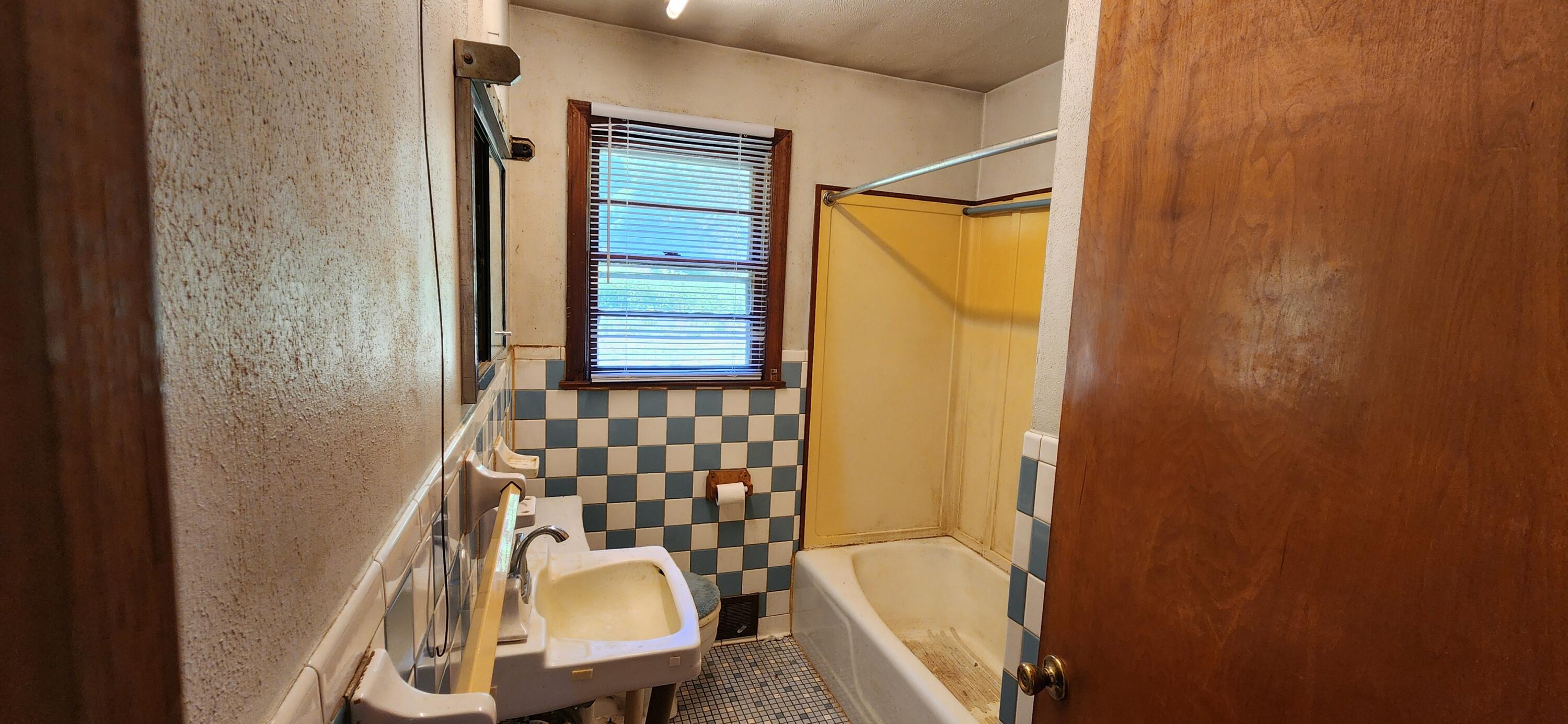 1762 Runnett Bag Road Ferrum, VA 24088 - Photo 8 of 14 a bathroom with a sink and a mirror