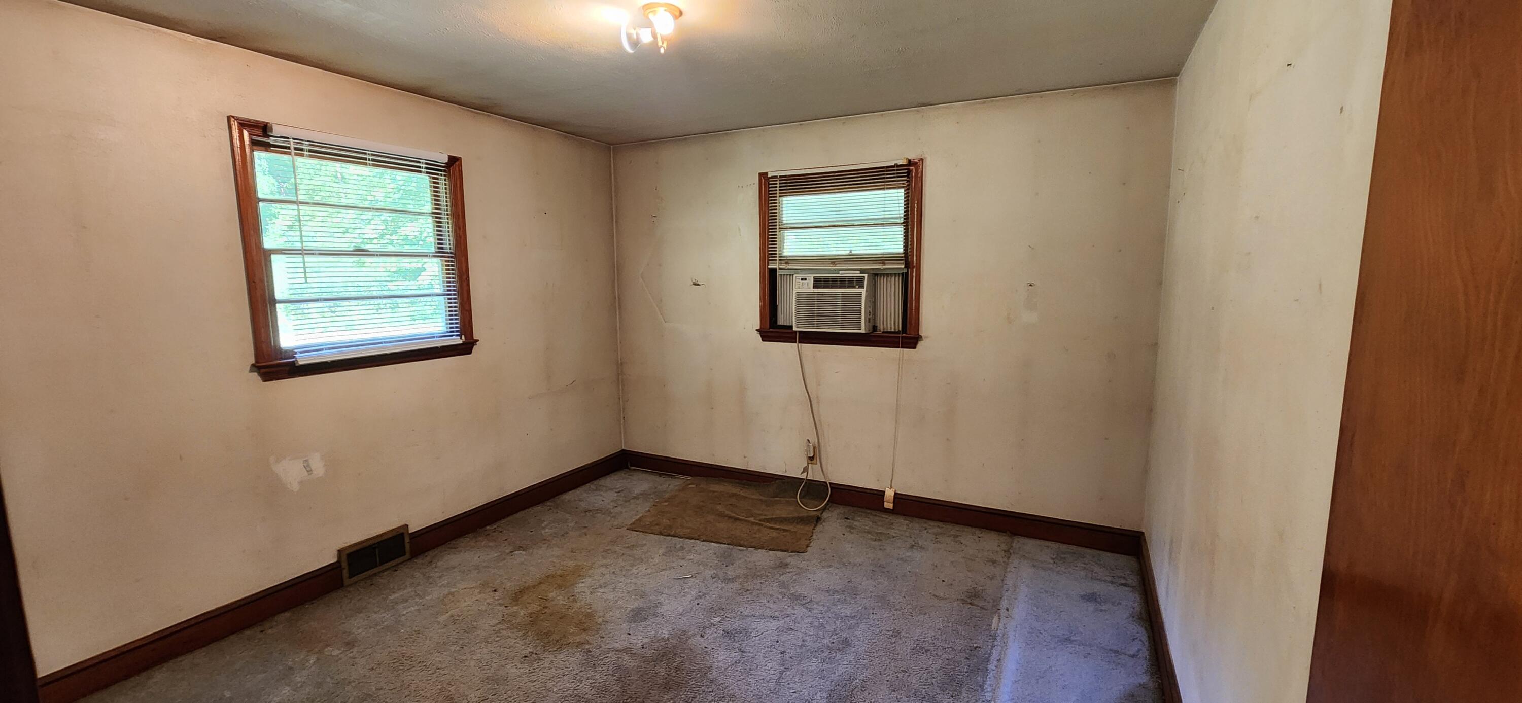 1762 Runnett Bag Road Ferrum, VA 24088 - Photo 9 of 14 an empty room with windows