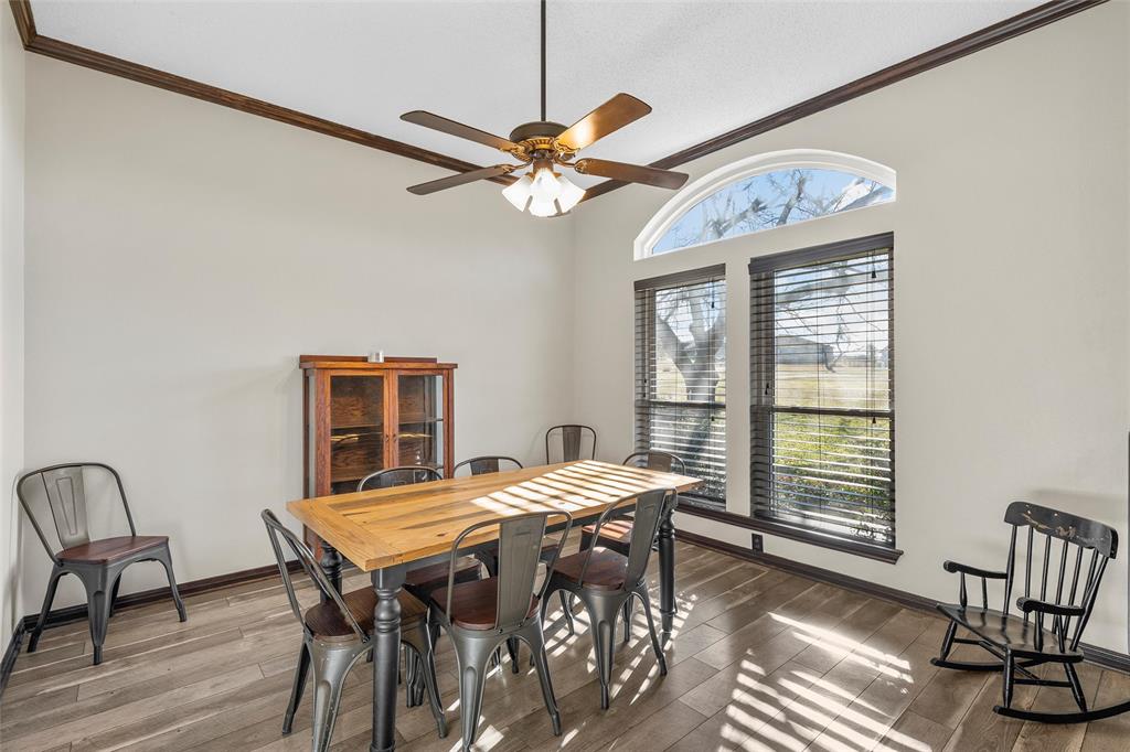 361 Vandiver Road Moody, TX 76557 - Photo 19 of 33 a view of a dining room with furniture window and wooden floor