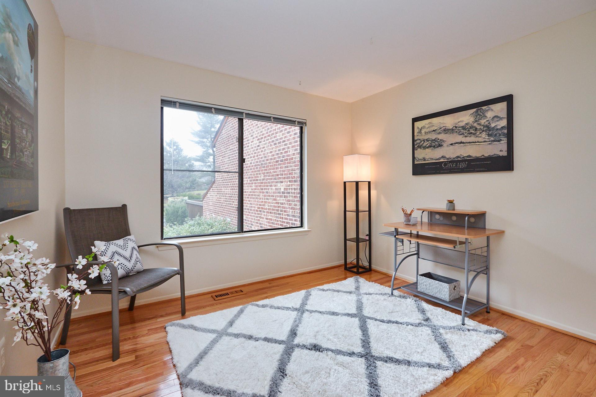 2113 Cabots Point Lane Reston, VA 20191 - Photo 19 of 56 a living room with furniture and wooden floor