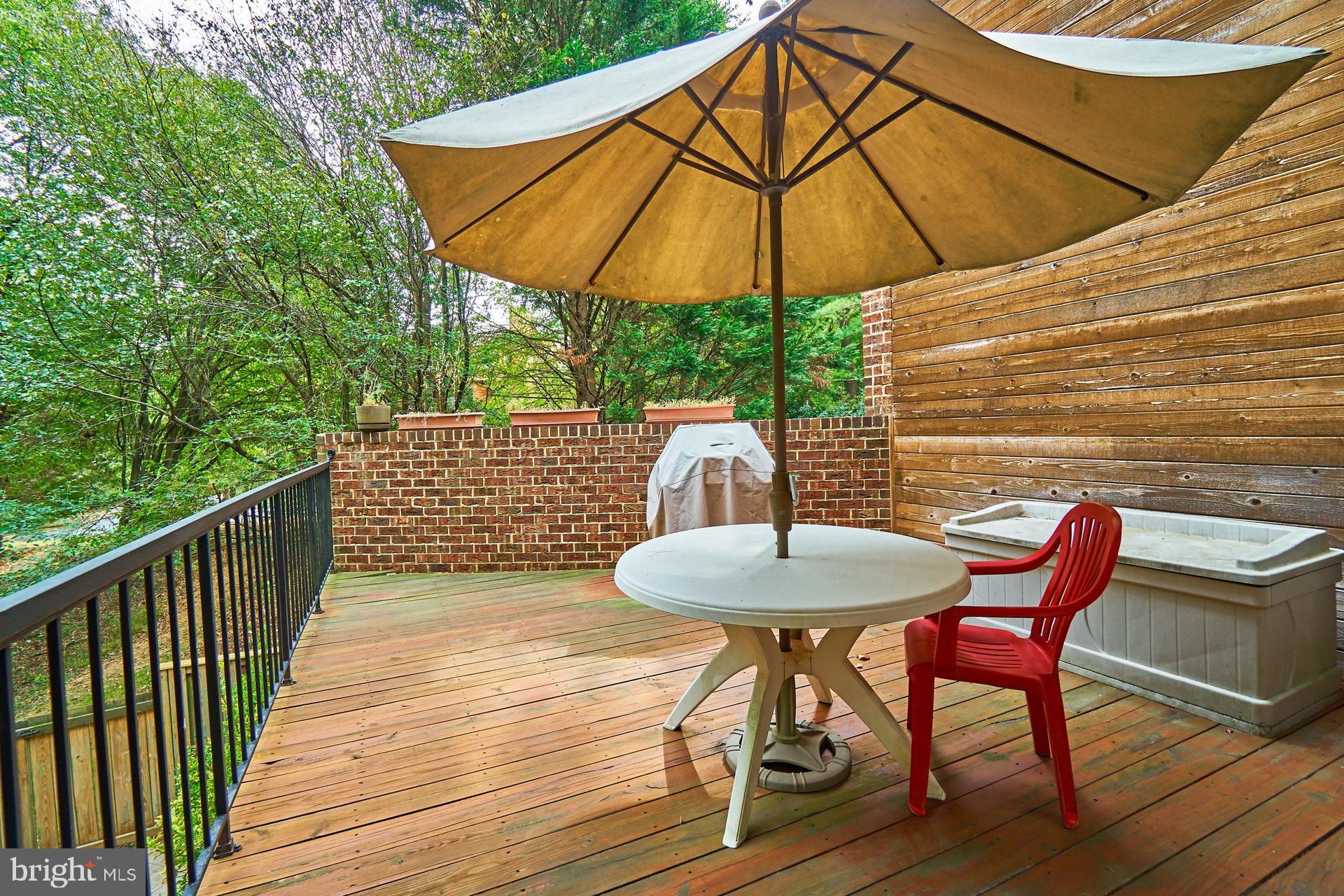 2113 Cabots Point Lane Reston, VA 20191 - Photo 29 of 56 a view of deck with furniture and umbrella