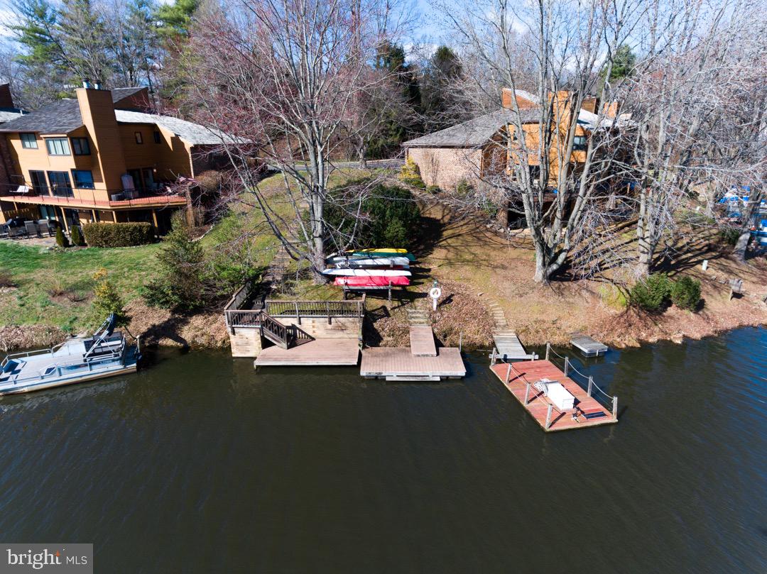 2113 Cabots Point Lane Reston, VA 20191 - Photo 37 of 56 a view of back yard of the house with green space and outdoor seating