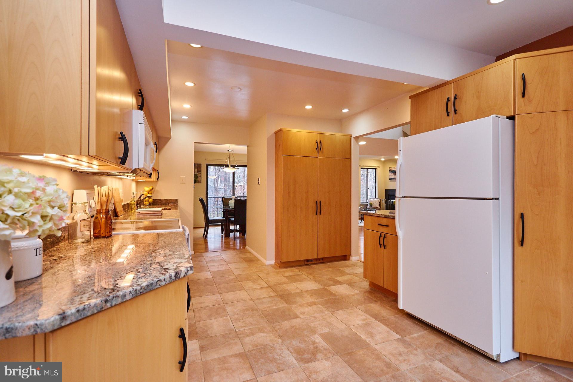2113 Cabots Point Lane Reston, VA 20191 - Photo 9 of 56 a kitchen with refrigerator and countertop