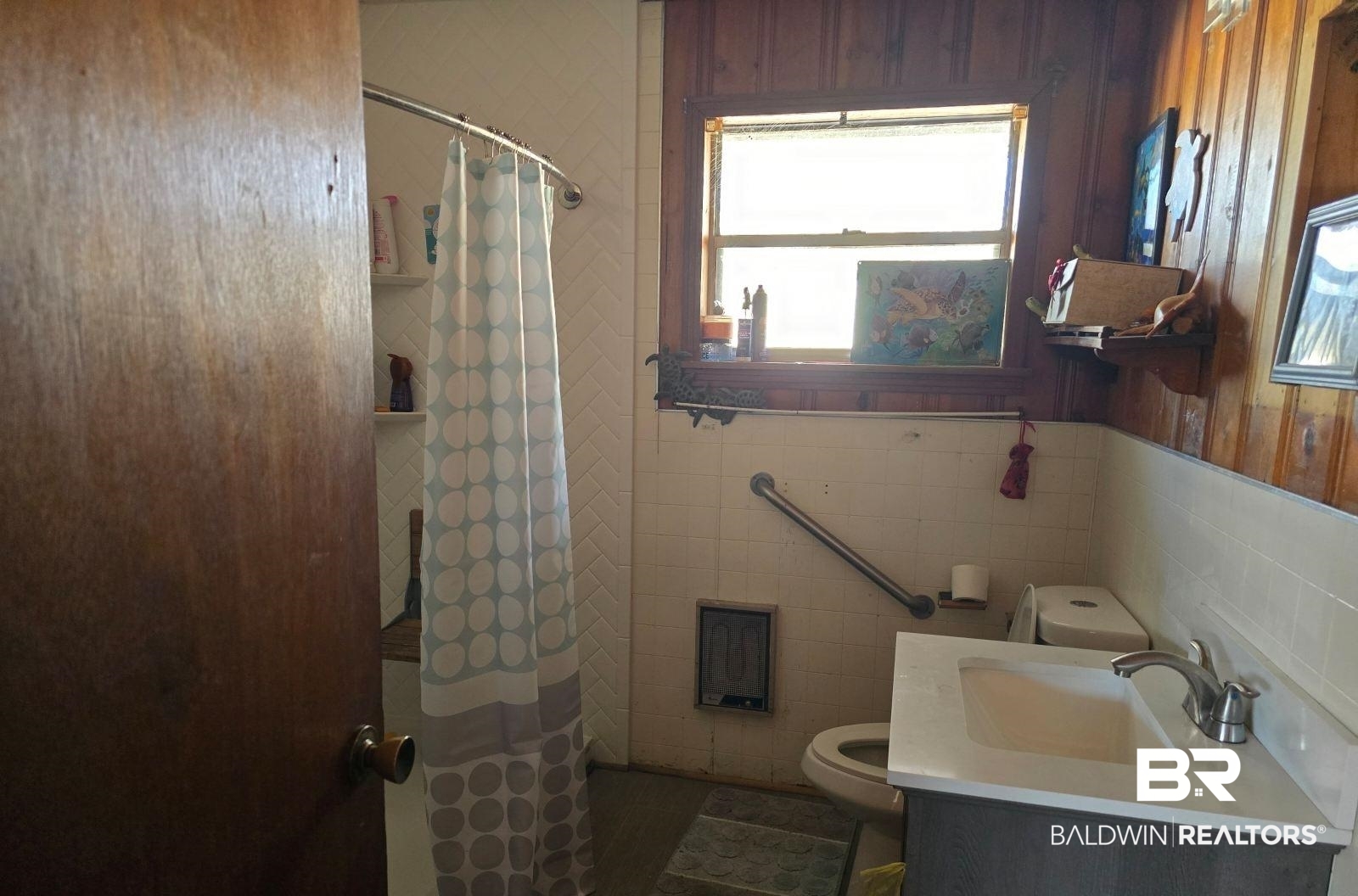 44244 Highway 31 Brewton, AL 36426 - Photo 6 of 6 Bathroom featuring walk in shower, vanity, toilet, and tile walls