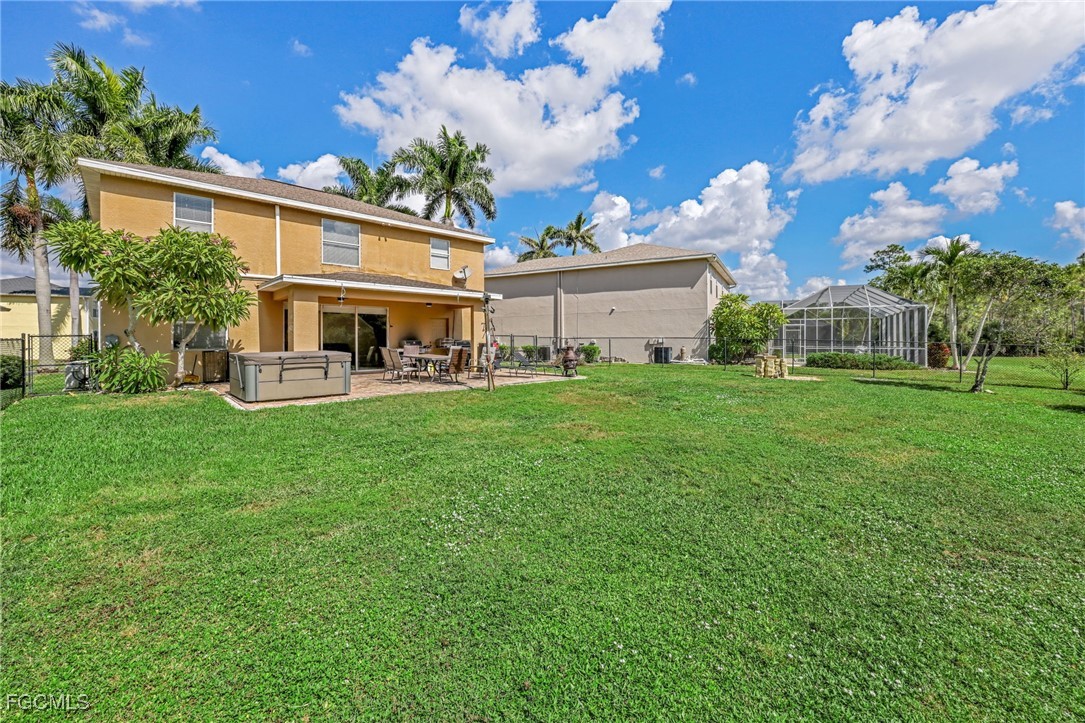 14067 Danpark Loop Fort Myers, FL 33912 - Photo 30 of 41 a view of a house with a big yard