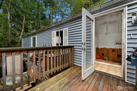 a porch with wooden floor