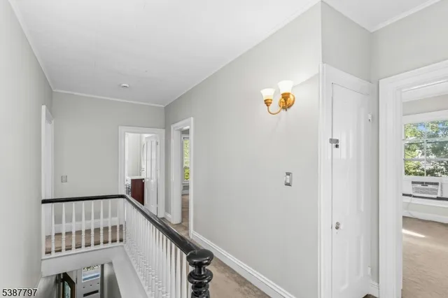 a view of hallway with closet
