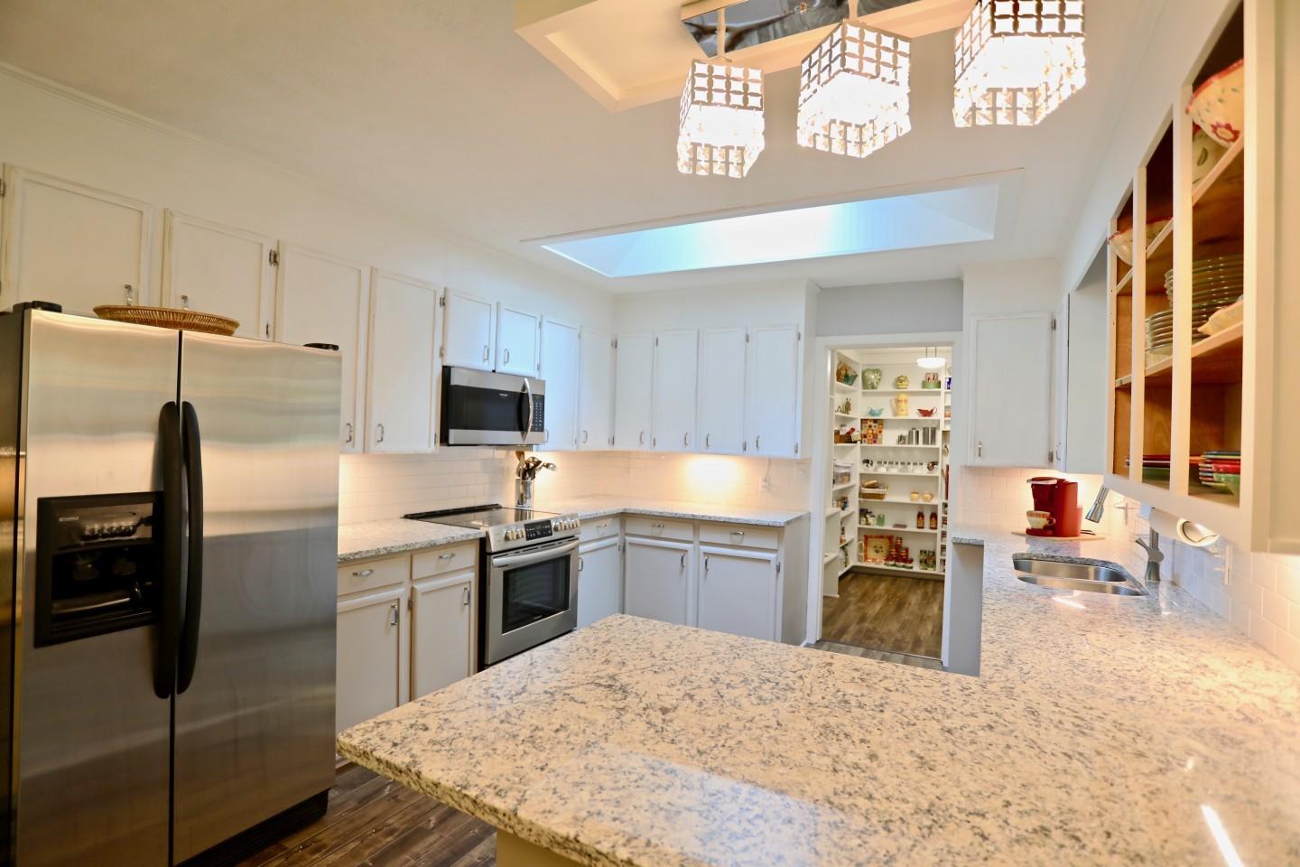 170 Boiling Spring Circle Southern Pines, NC 28387 - Photo 8 of 46 Kitchen with new granite, appliances and lighting