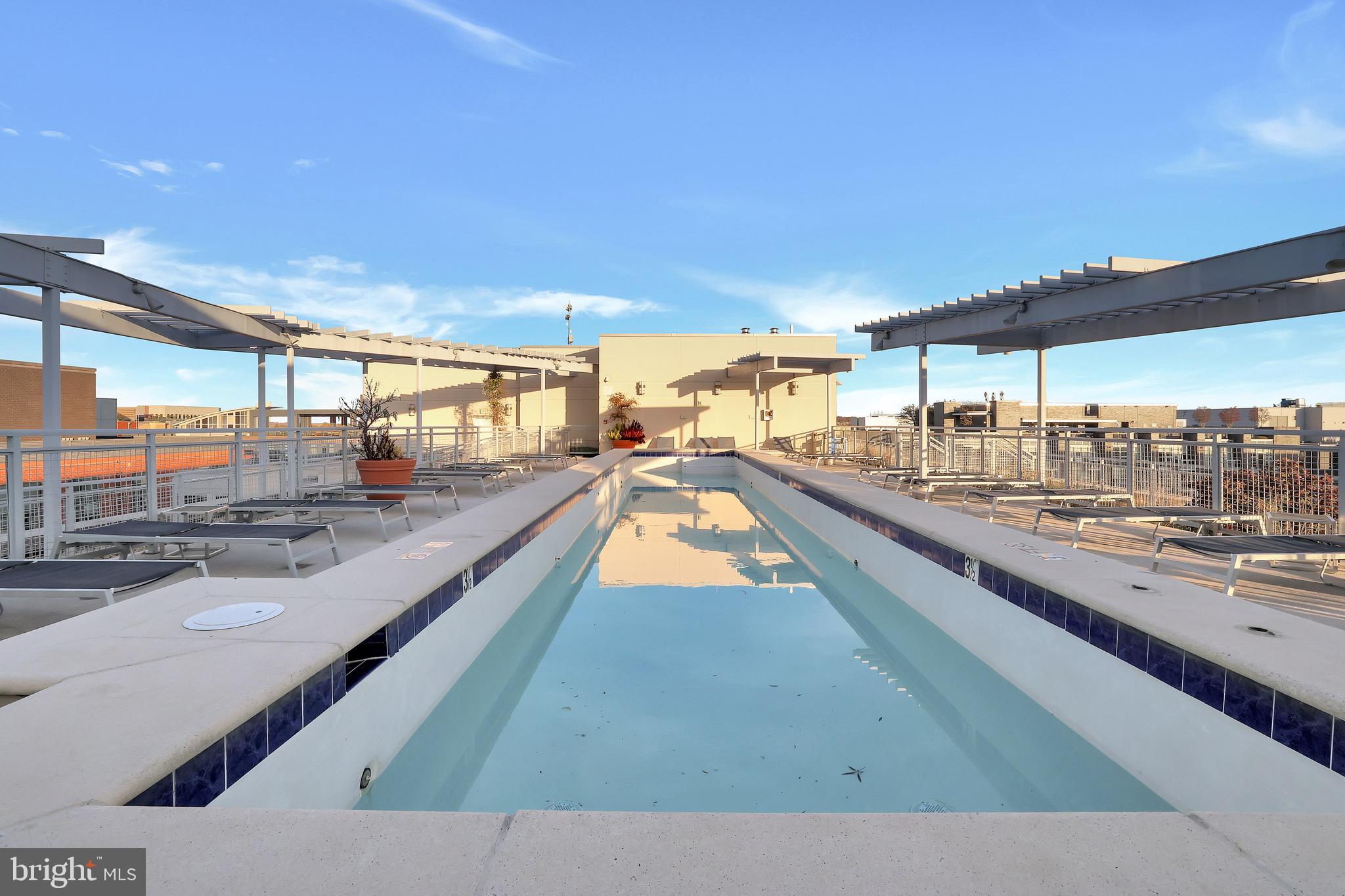 1025 First Street Southeast, Unit 602 Washington, DC 20003 - Photo 26 of 49 a view of a living room and kitchen