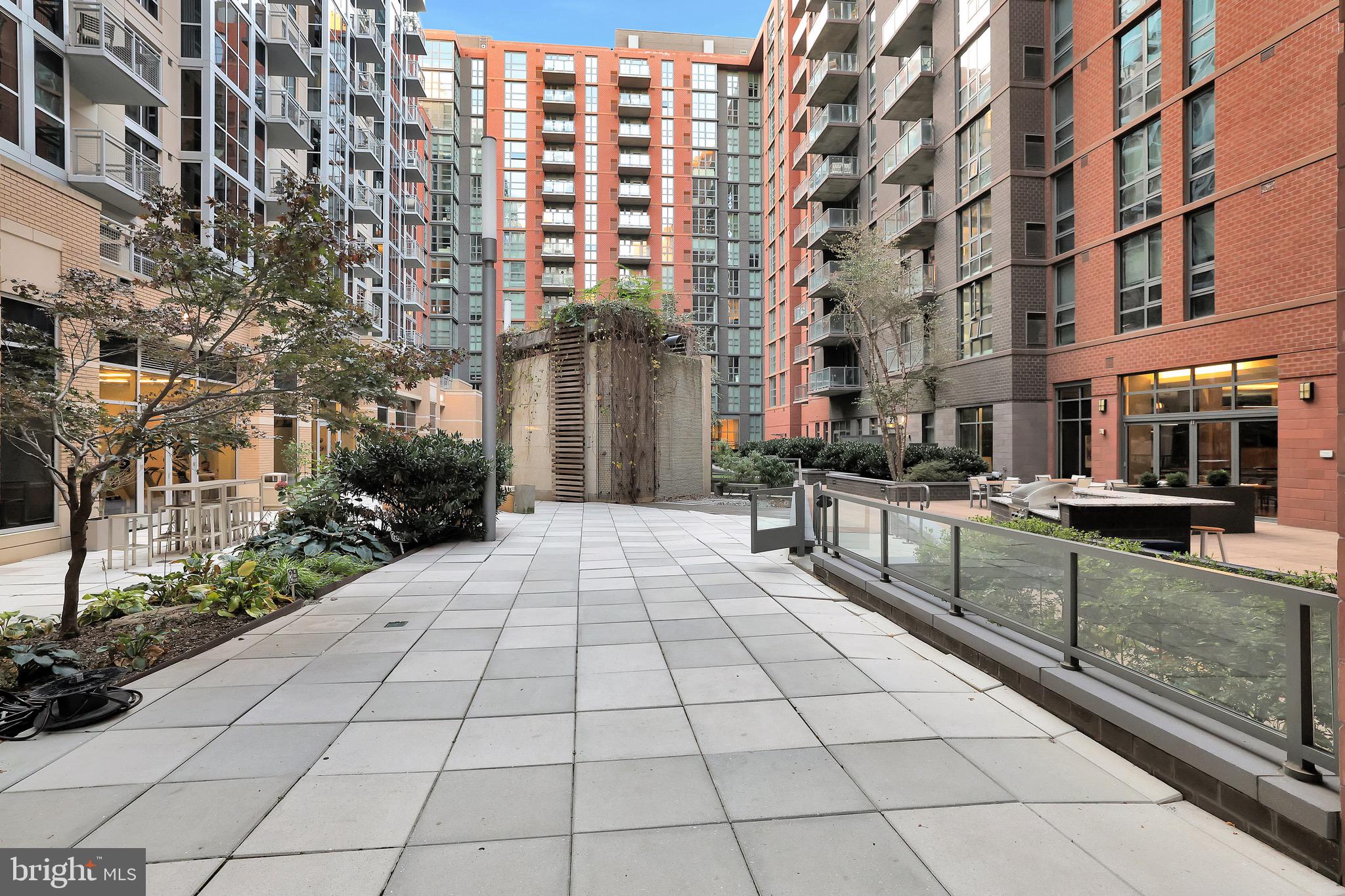 1025 First Street Southeast, Unit 602 Washington, DC 20003 - Photo 33 of 49 a view of a building with many windows