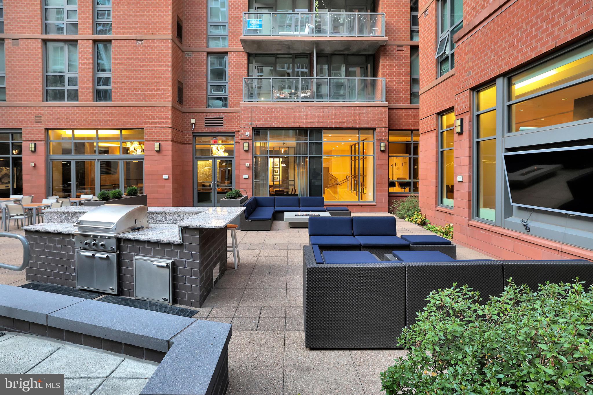1025 First Street Southeast, Unit 602 Washington, DC 20003 - Photo 34 of 49 a view of a chairs and table in the patio