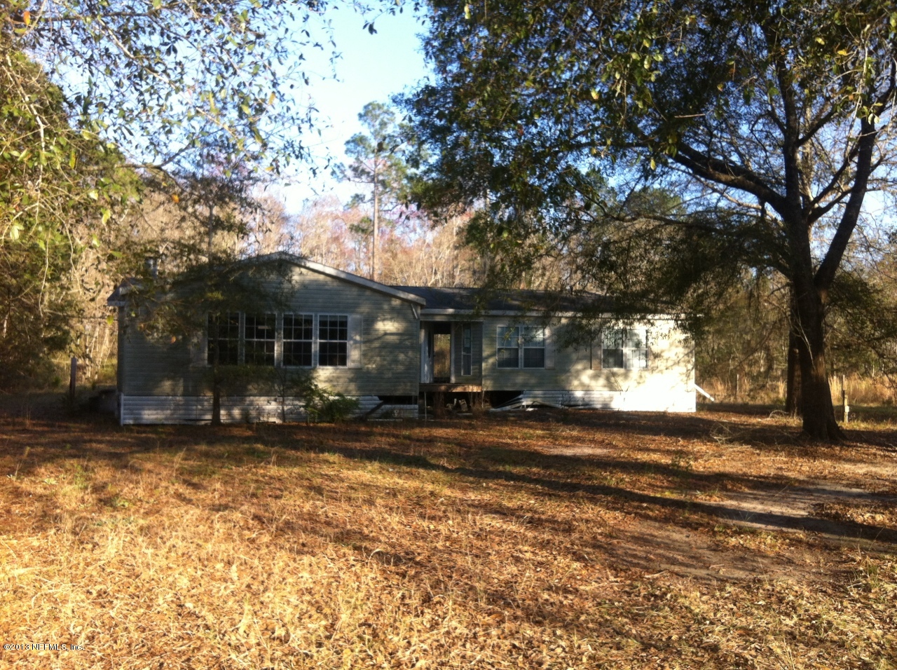 54426 Cravey Road Callahan, FL 32011 - Photo 1 of 1 a view of a house with a yard