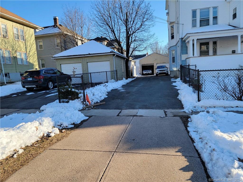 13 Hebron Street, Unit 1 Hartford, CT 06112 - Photo 1 of 1 a front view of a house with garden