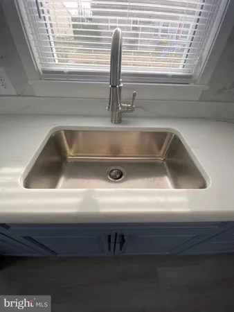 a close view of sink and a window