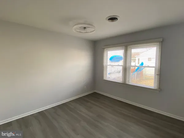 an empty room with window