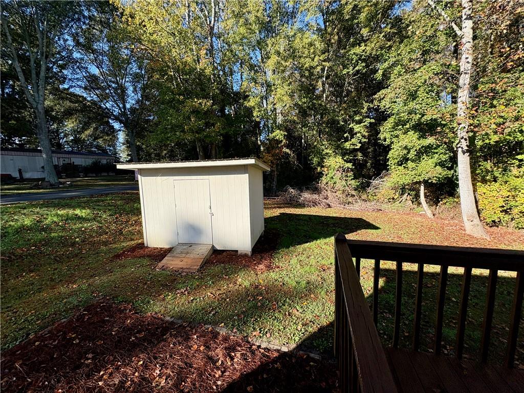 208 Maple Street Dawsonville, GA 30534 - Photo 17 of 21 a view of a backyard of the house
