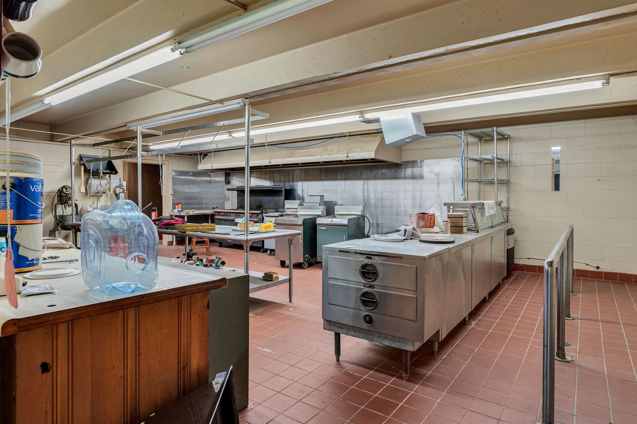 210 Woodruff Street Madison, TN 37115 - Photo 19 of 30 a kitchen with stainless steel appliances granite countertop a sink counter and cabinets