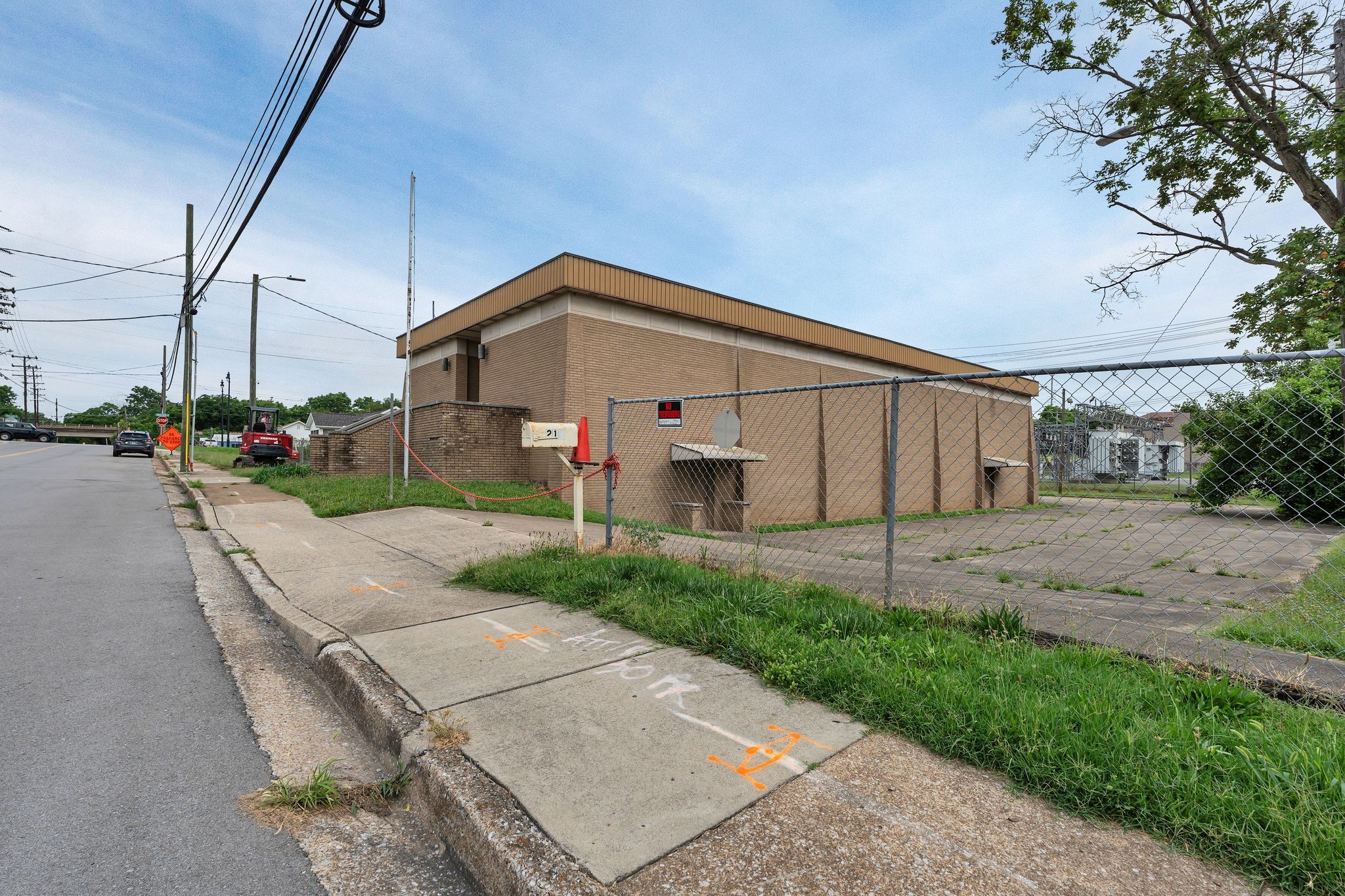 210 Woodruff Street Madison, TN 37115 - Photo 8 of 30 a front view of a house with a yard and garage
