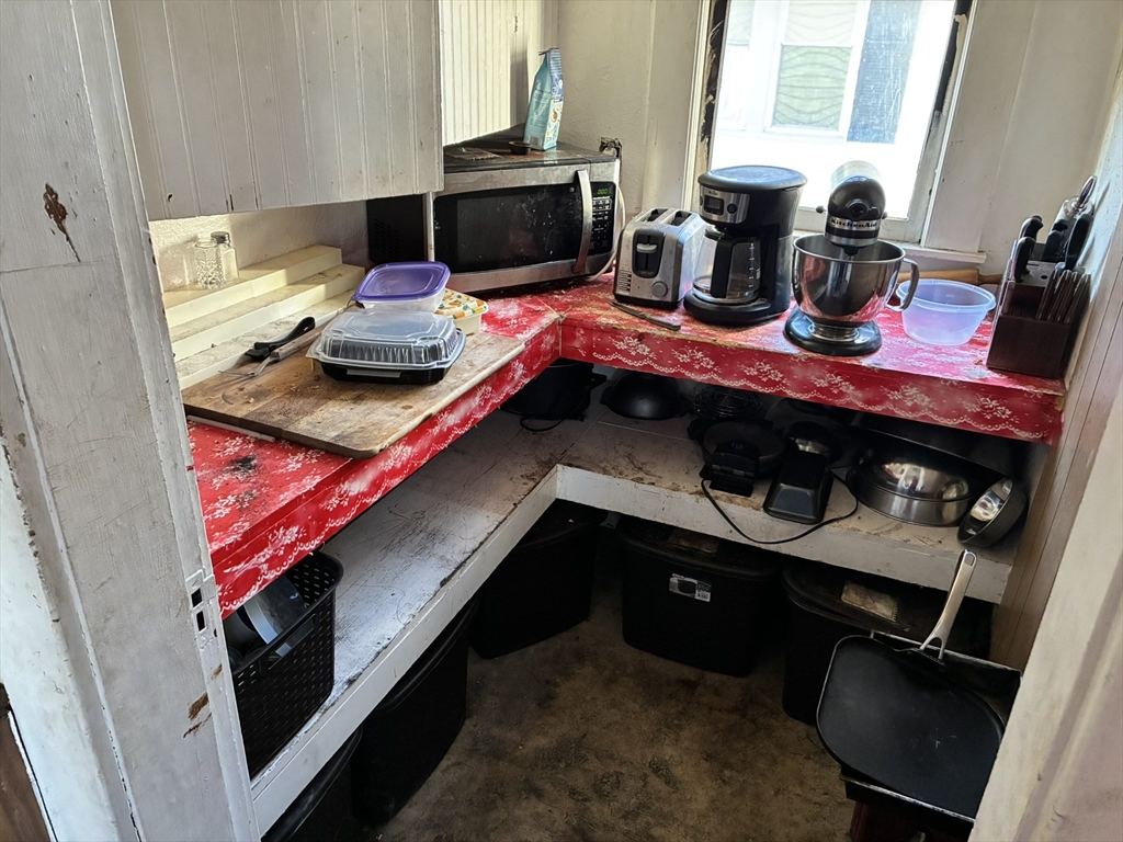 188 Windsor Street West Springfield, MA 01089 - Photo 13 of 13 a living room with furniture and a fireplace