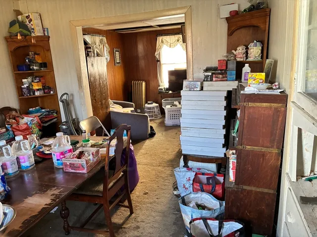 a room with furniture or couch and a dining table