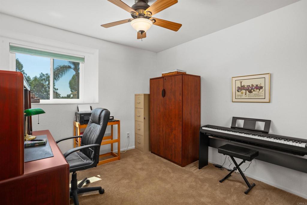 1991 Paseo Del Rey Vista, CA 92084 - Photo 26 of 42 a work room with furniture and windows