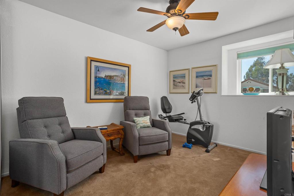 1991 Paseo Del Rey Vista, CA 92084 - Photo 27 of 42 a living room with furniture and a window