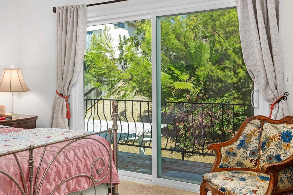 1991 Paseo Del Rey Vista, CA 92084 - Photo 33 of 42 a bedroom with a bed and a window