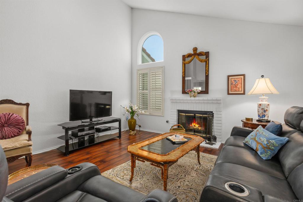1991 Paseo Del Rey Vista, CA 92084 - Photo 6 of 42 a living room with furniture and a flat screen tv